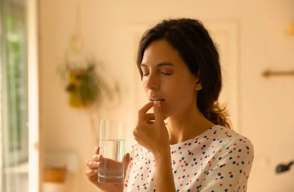 Woman taking antidepressants. Causes of Constipation. Brisbane Livewell Clinic