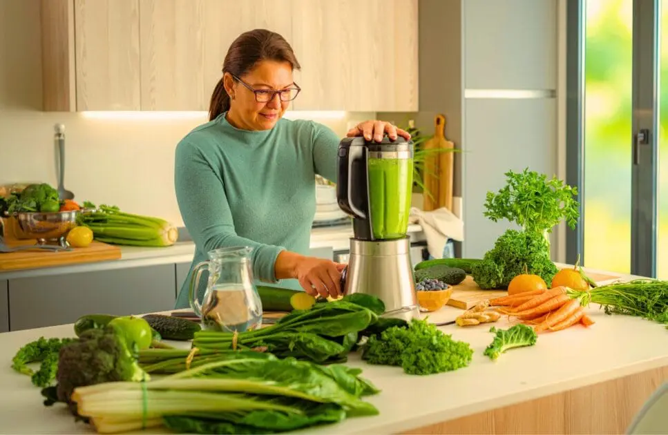 Woman preparing a healthy detox drink. Heavy Metal and Parasite Detox. Menopausal Symptoms. Clinical Nutritionist Balmoral. Brisbane Livewell Clinic