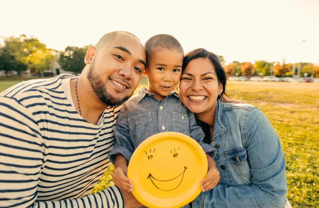 Portrait of a family smiling and enjoying outdoors. Hypnosis Wavell Heights. Brisbane Livewell Clinic