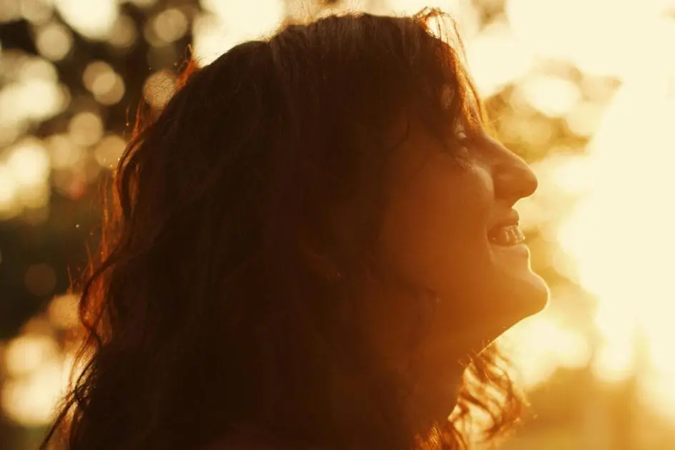 A close-up shot of a woman smiling. Counselling Camp HIll. Brisbane Livewell Clinic