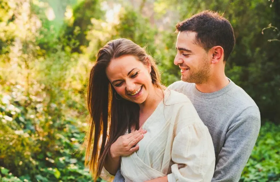 Couple hugging and laughing outdoors. Marriage Counselling. Brisbane Livewell Clinic. Genetic Methylation Test