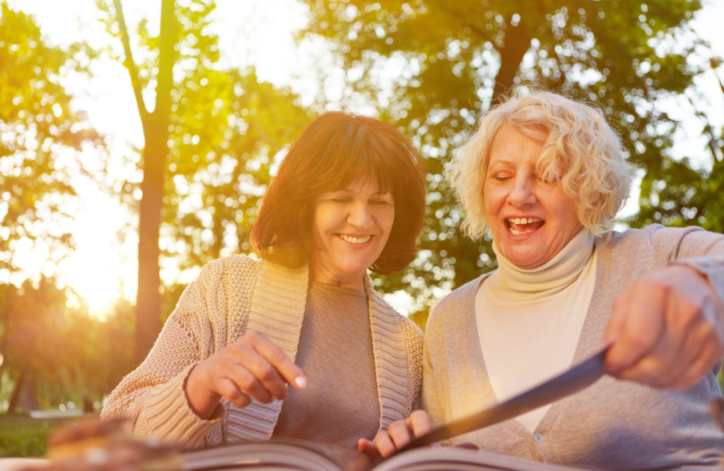 Women happily reading a book. Managing Menopause. Brisbane Livewell Clinic