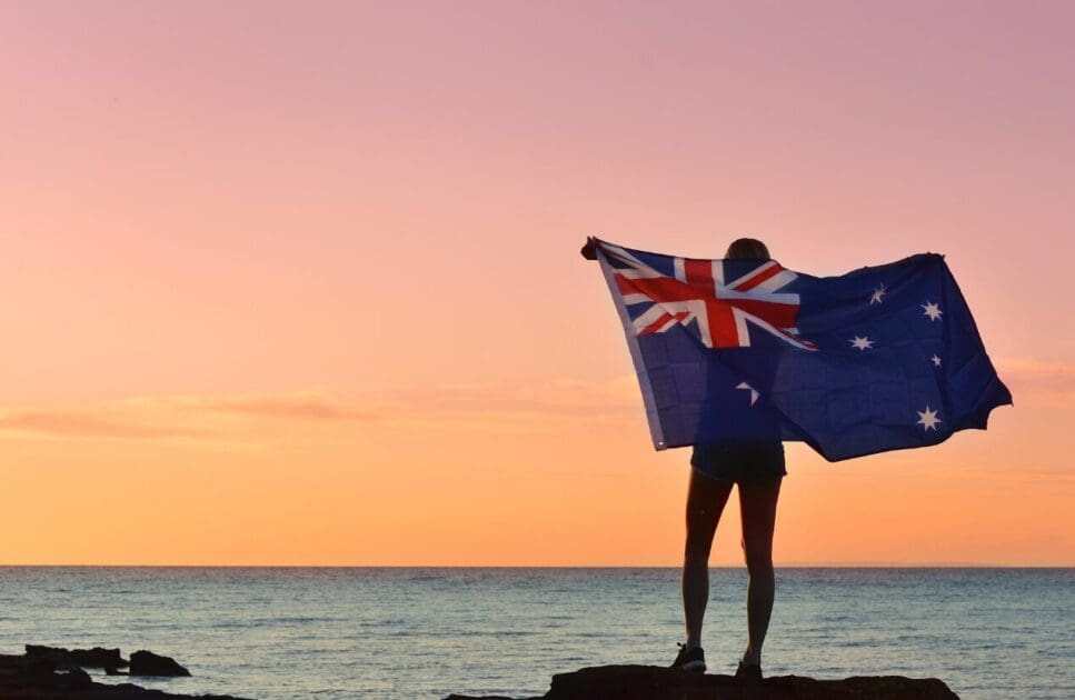 Person holding an Australian flag. Plant Based Eating from around the World. Brisbane Livewell Clinic
