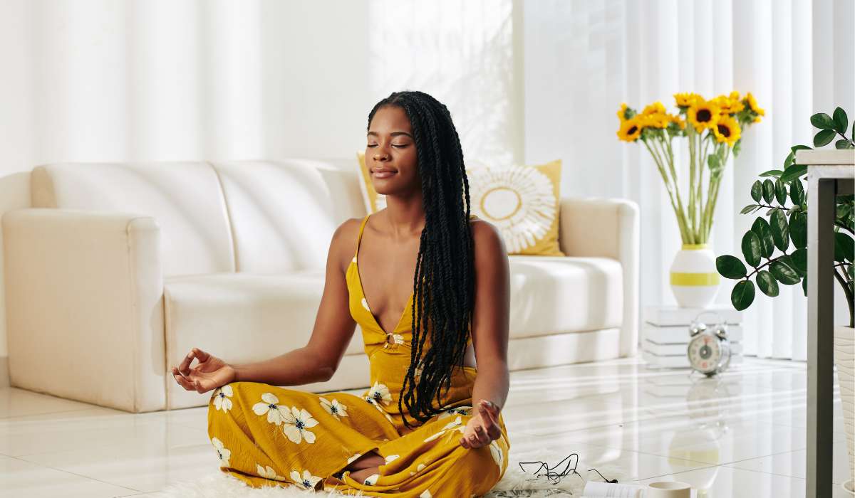 A Women doing Mindfulness-based stress reduction at home. Brisbane Livewell Clinic.