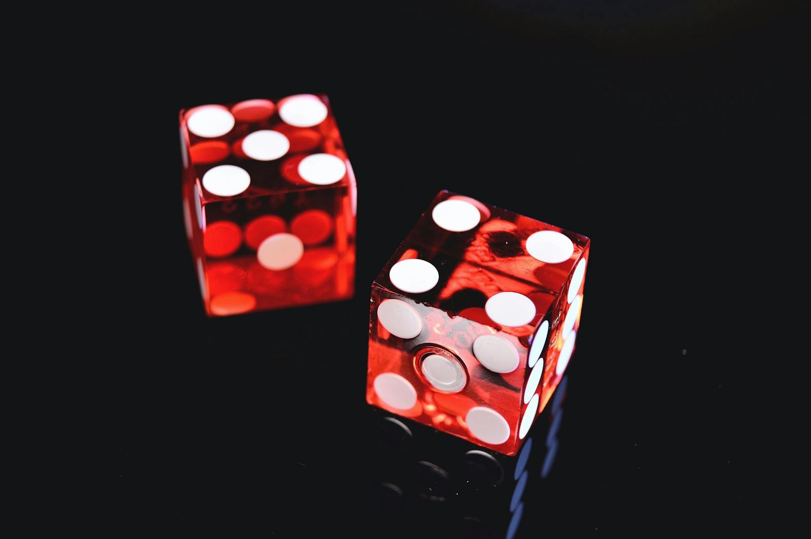 Closeup Photo of Two Red Dices Showing 4 and 5. Hypnosis for gambling at Brisbane Livewell Clinic