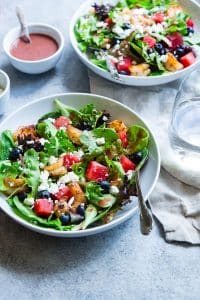 vegetable salad on white ceramic bowl. Daily ritual gut health