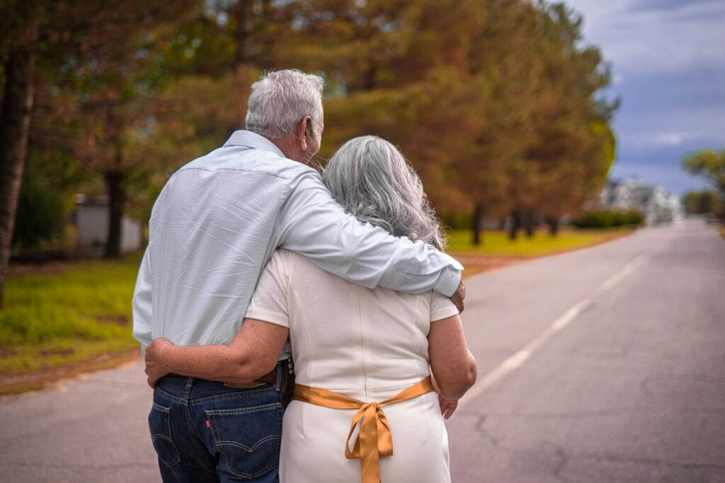 Kinesiology Near Me: Discover your Local Kinesiologist at Brisbane Livewell Clinic 2 Older couple hugging on the road. Kinesiology near me. Genetic Methylation Test