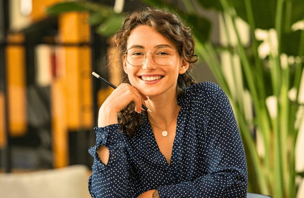 Woman smiling after a successful hypnotherapy for weight loss. Hypnosis and weight loss. Osteopathy for Scoliosis and Spinal Curvature. Brisbane Livewell Clinic