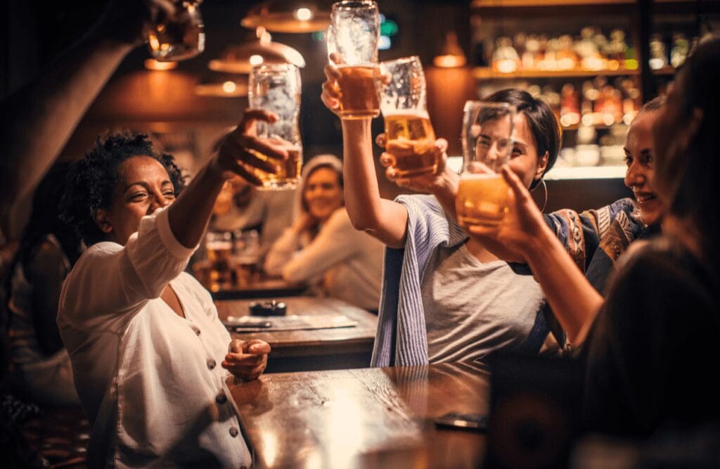 Friends having fun drinking beer. Hypnosis Brisbane. Hypnosis and Alcoholism. Brisbane Livewell Clinic