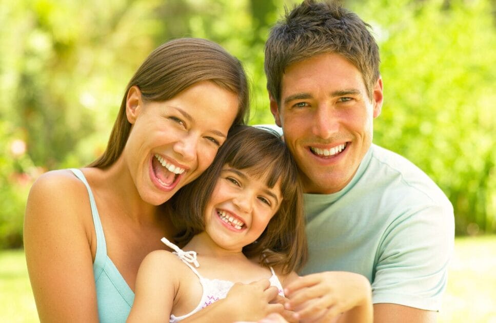 Mother and father embracing their young daughter. Naturopathic Anxiety Medication. Brisbane Livewell Clinic. Clinical Hypnotherapy. Methylation Test Near Me. Heavy Metal Detox for Kids. What is Leaky Gut Australia