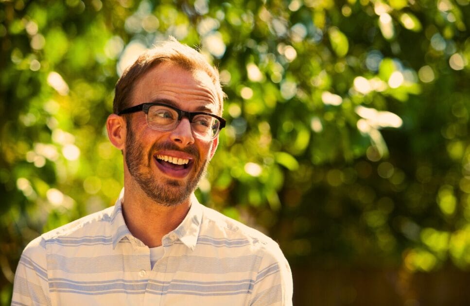 Smiling man enjoys nature outdoors. Genetic Methylation Test. Brisbane Livewell Clinic