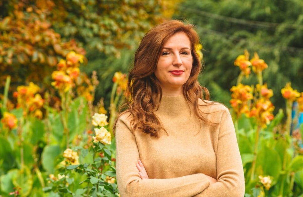 Woman standing in a flower garden. Genetic Methylation Test. Brisbane Livewell Clinic