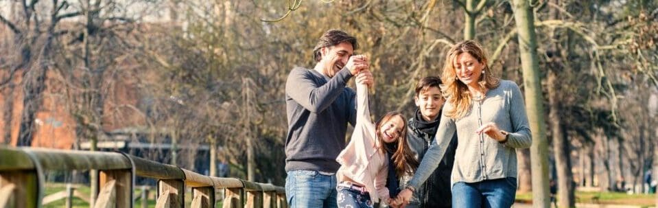 Family having fun in the park. Naturopath Noosa. Brisbane Livewell Clinic